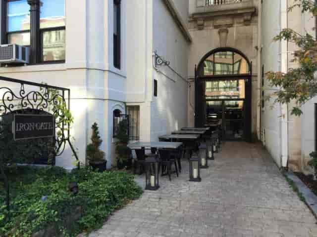 Charming Iron Gate Side Courtyard for intimate gatherings and cocktail receptions.