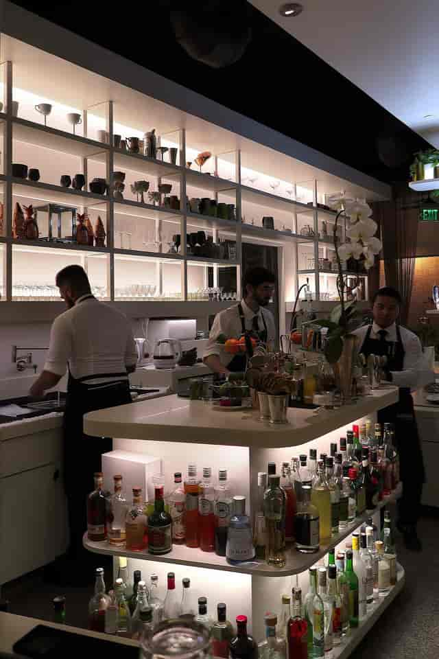 Sleek modern bar at Minibar & Barmini, perfect for upscale networking events.