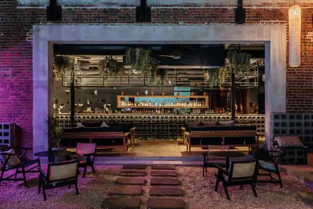 Stylish outdoor venue for full restaurant buyout, ideal for cocktail receptions and gatherings.