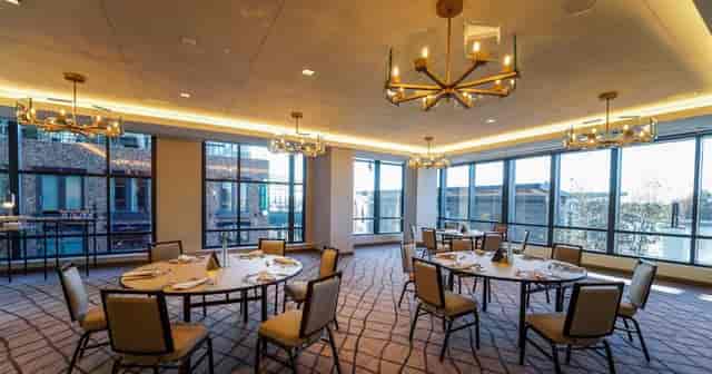 Elegant event space with round tables and natural light at InterContinental Washington D.C.