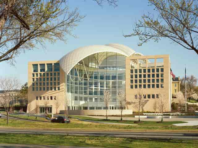Modern event space with glass windows at United States Institute of Peace for conferences.