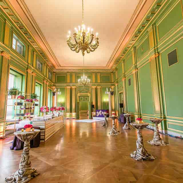 Elegant Green & Gold Room in Mellon Auditorium, perfect for weddings and corporate events.