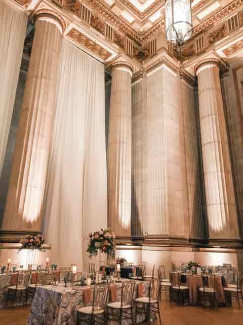 Grand Andrew W. Mellon Auditorium with columns, ideal for weddings and formal events.