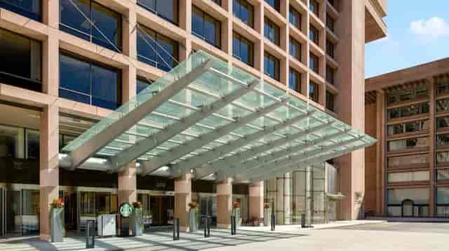 L'Enfant Bar and Grill entrance with sleek glass canopy, ideal for events in DC.