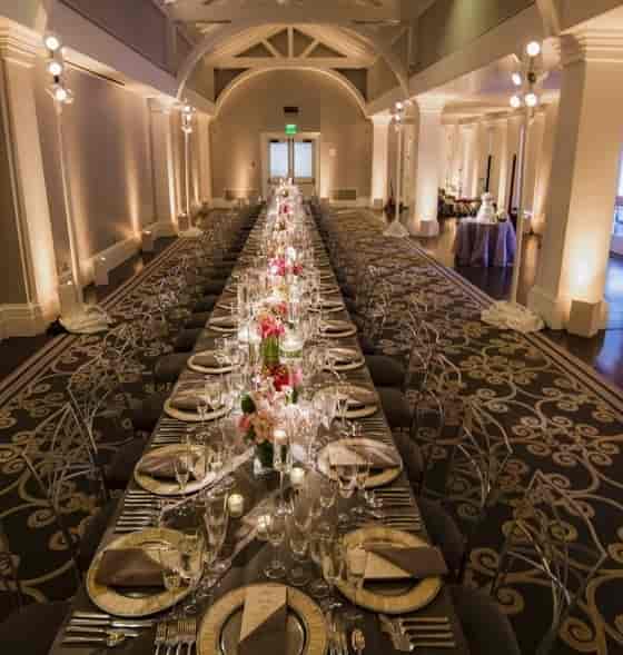 Elegant banquet table with floral centerpieces in Historic Decatur House for formal events.