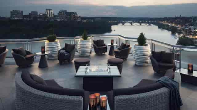 Rooftop Bar at Hotel Washington with scenic river view, ideal for upscale events.