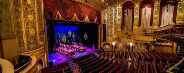 Elegant balcony stage at Warner Theatre, perfect for galas and awards ceremonies.