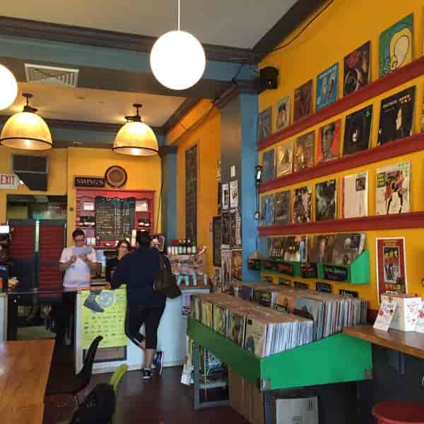 Vibrant American restaurant in Songbyrd Music House, ideal for casual meetings and events.