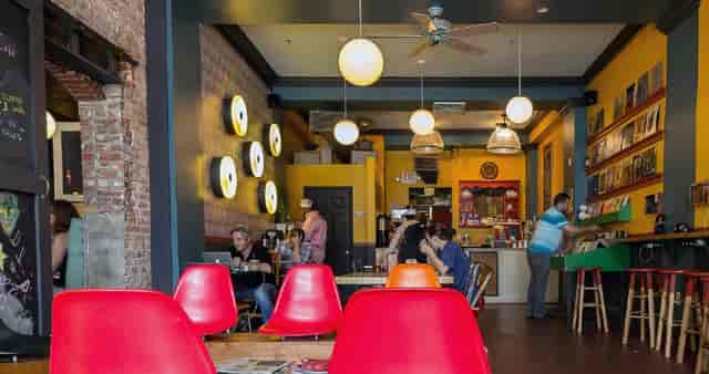 Vibrant café at Songbyrd Music House, ideal for networking and informal meetings.