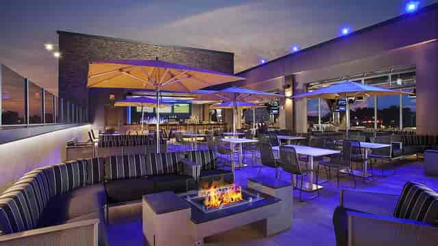 Rooftop Terrace at Topgolf D.C. with modern seating for events and gatherings.