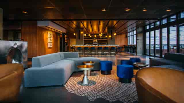 Modern bar with sleek design, ideal for networking events and casual meetings.