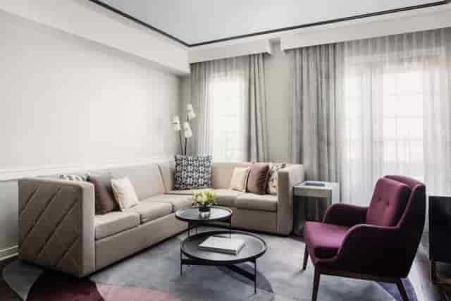 Diplomat Suite lounge in Archer Hotel Alexandria, perfect for networking events and meetings.