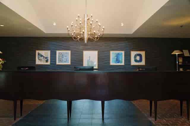 Brabo Back Room reception with elegant chandelier, perfect for events in Alexandria.