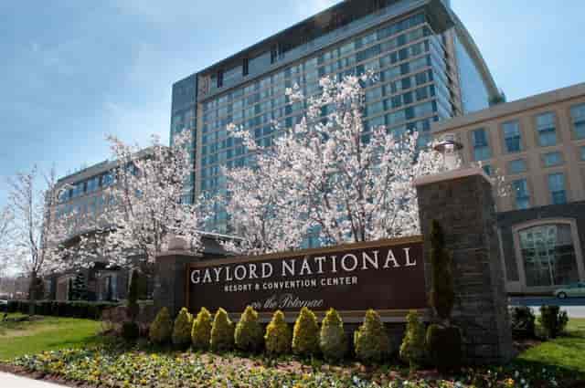 Gaylord National Resort Convention Center with cherry blossoms, ideal for events and meetings.