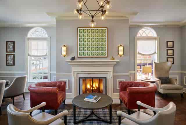 Cozy lounge with fireplace in Arlandria, perfect for networking events and meetings.