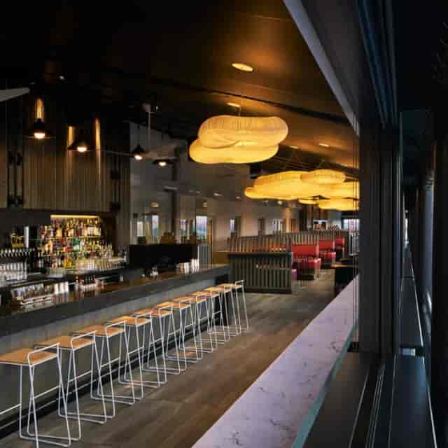 Modern event space Vue Terrace with sleek bar, ideal for networking and cocktail receptions.