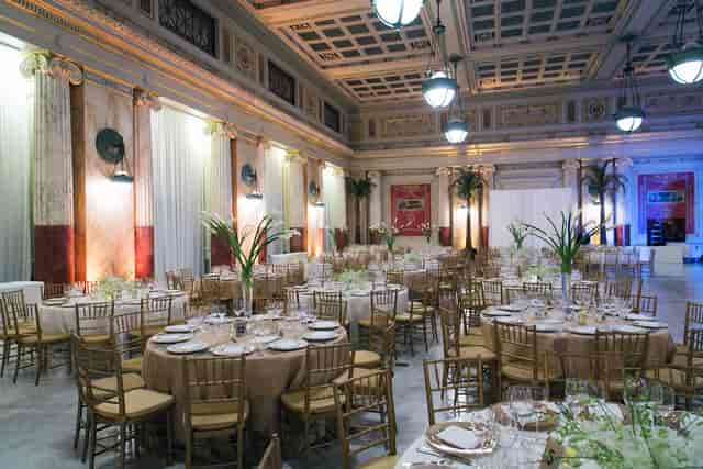 Elegant Grand Ballroom Pre-Function with round tables, ideal for upscale events and weddings.