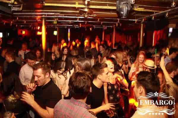 Vibrant dance club scene at Embargo Republica, perfect for parties and networking events.