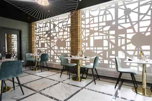 Modern dining space at Elite Hotel Arcadia, perfect for upscale events and gatherings.