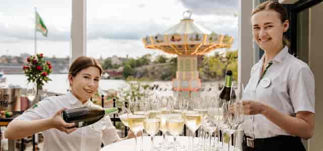 Champagne service at Gröna Lund's Terrassen for elegant corporate events.