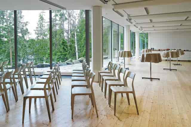 Modern event space with large windows, perfect for workshops and networking at Artipelag.