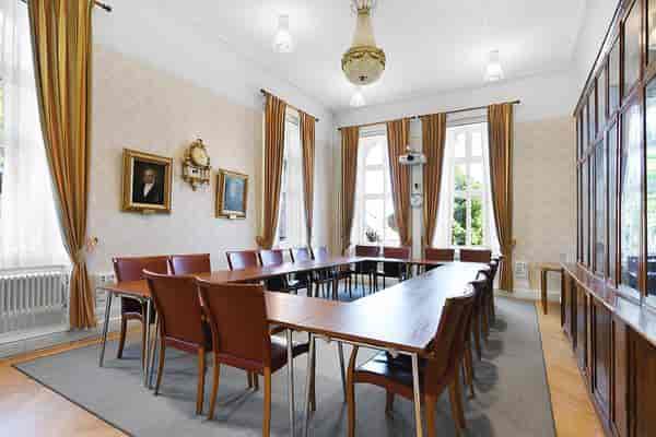 Clara Eckerströmsalen meeting room with elegant decor for workshops and board meetings.