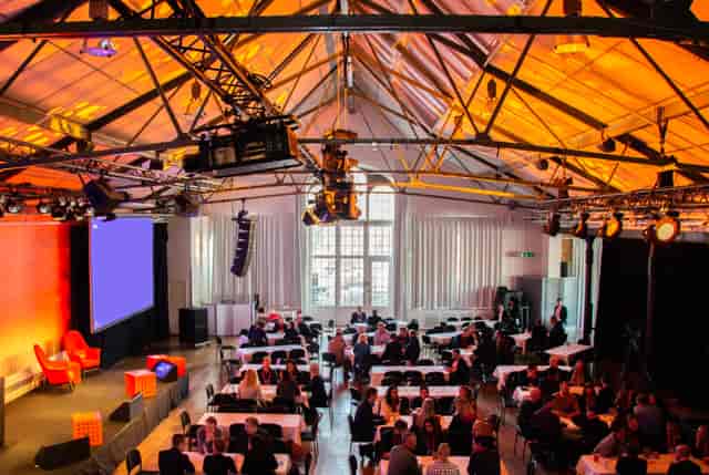 Event venue in Münchenbryggeriet with high ceiling, perfect for conferences and corporate meetings.