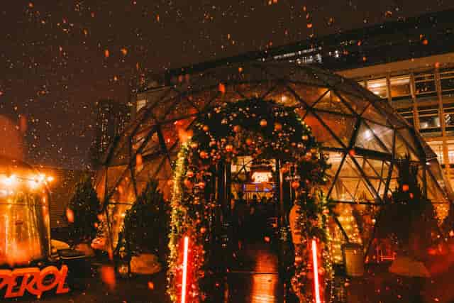Winter Oasis geodesic dome with festive decor, perfect for holiday parties and winter events.