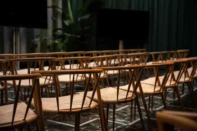 Ljusgården seating setup with wooden chairs, perfect for workshops and gatherings.