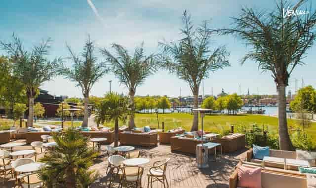 Vibrant outdoor event venue in Josefina Stockholm with scenic waterfront view.
