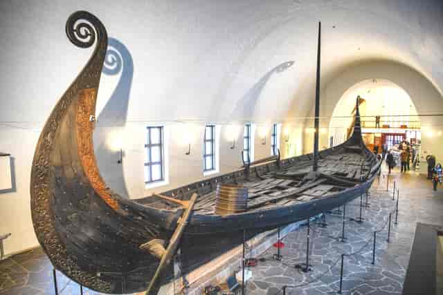 Viking ship display in museum, ideal for themed events and educational gatherings.