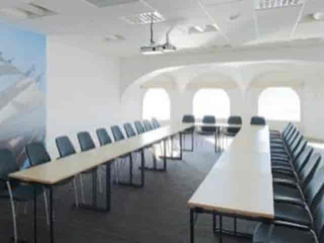 Spacious Scandic Foresta conference room with natural light for meetings and brainstorming.