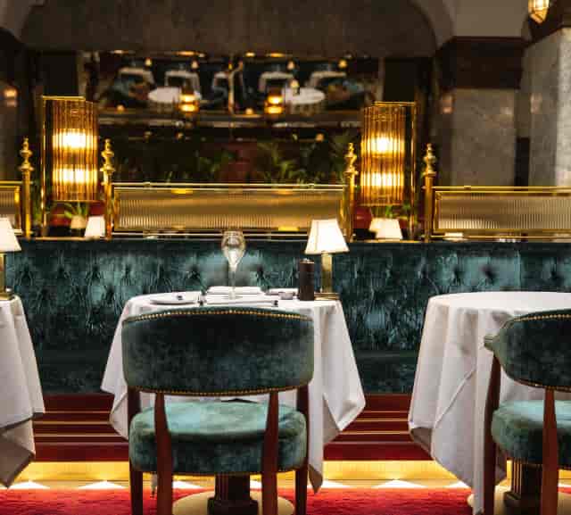 Elegant dining setup at Bank Hotel, perfect for upscale events and intimate meetings.