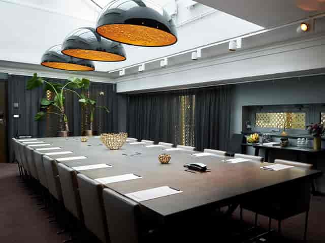Sophisticated conference room with sleek table at Clarion Hotel Stockholm for events.