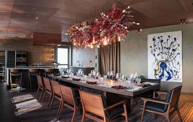 Elegant beer garden with floral centerpiece, ideal for networking dinners and private events.
