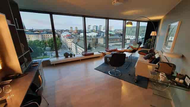 Modern living room at Clarion Hotel Sign, ideal for corporate meetings and workshops.