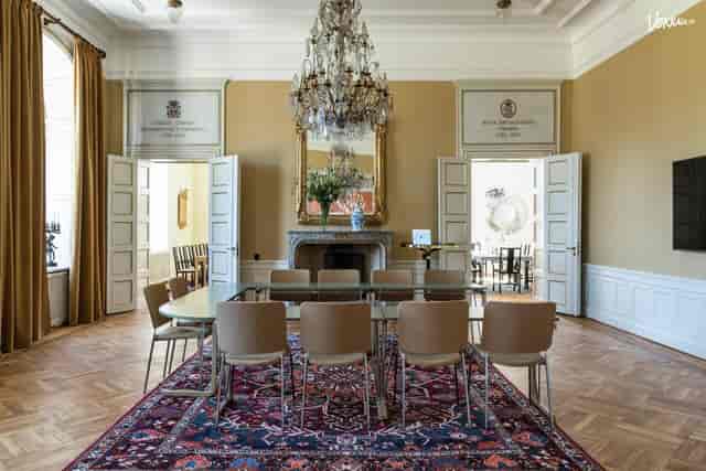 Sophisticated conference room with glass table, ideal for meetings and events at Näsby Slott.
