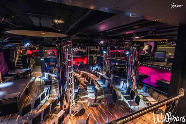 Bar in Wallmans Stockholm with tiered seating for events, performances, and networking.