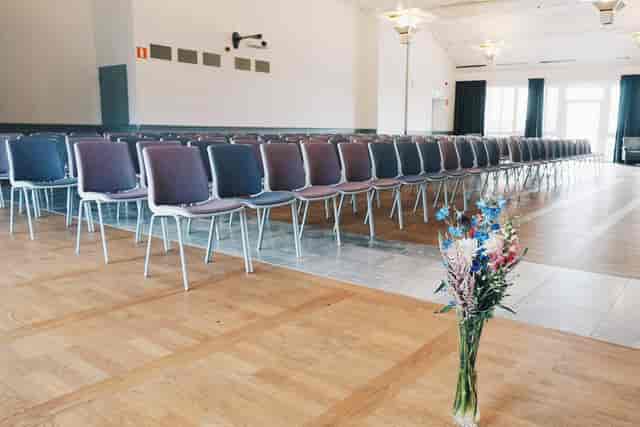 Corporate event venue at Grand Hotel Saltsjöbaden with elegant floral arrangement.