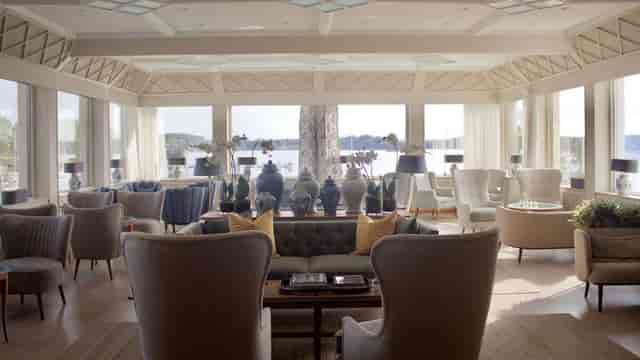 Corporate event space at Grand Hotel Saltsjöbaden with elegant furnishings and waterfront view.
