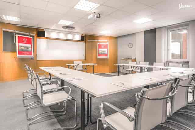 Meeting room at Skogshem & Wijk with U-shaped seating for productive events.