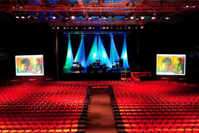 Event space at Annexet, Avicii Arena with vibrant lighting for conferences and performances.