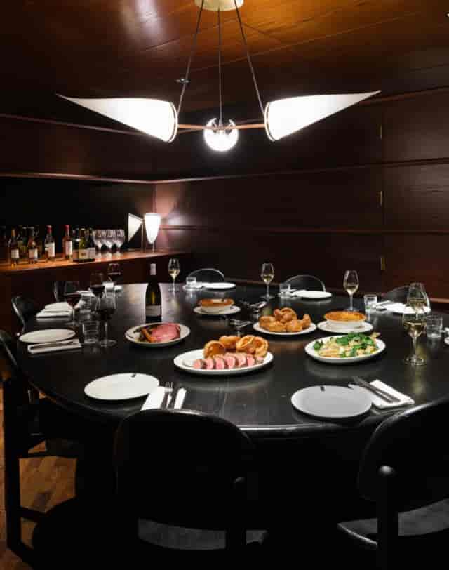 Private dining room at Lasdun Restaurant, elegant setup for corporate events and dinners.