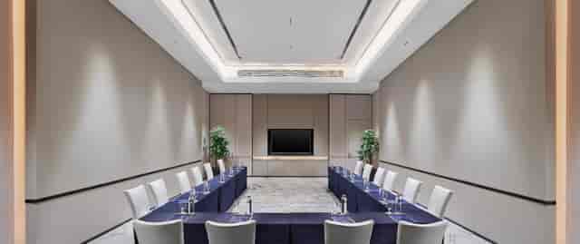 Meeting room at DoubleTree by Hilton Shanghai, U-shaped seating for corporate events.