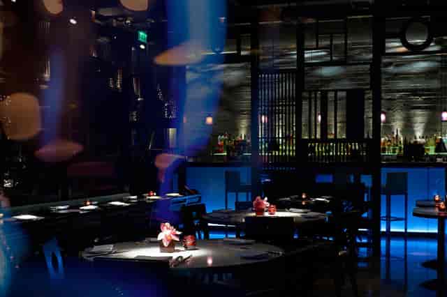 Cage at Hakkasan Shanghai: elegant dining space for corporate events and gatherings.