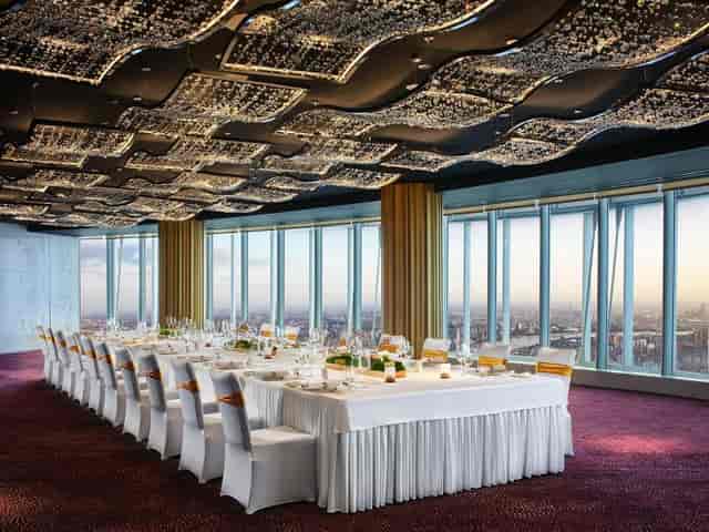 Soirée Ballroom in J Hotel Shanghai with elegant dining table and city views for upscale events.