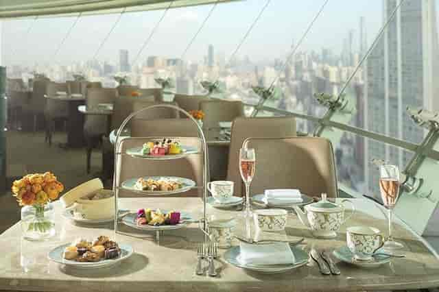 Elegant table setting for afternoon tea in Radisson Blu Shanghai, ideal for corporate events.