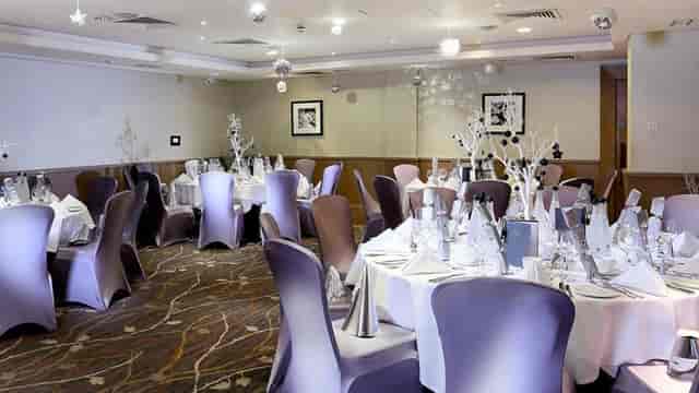 Elegant banquet room at Macdonald Windsor Hotel for corporate events and gatherings.