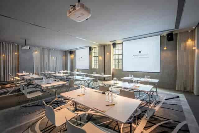 Modern Britannia Room at JW Marriott Singapore, ideal for professional events and presentations.