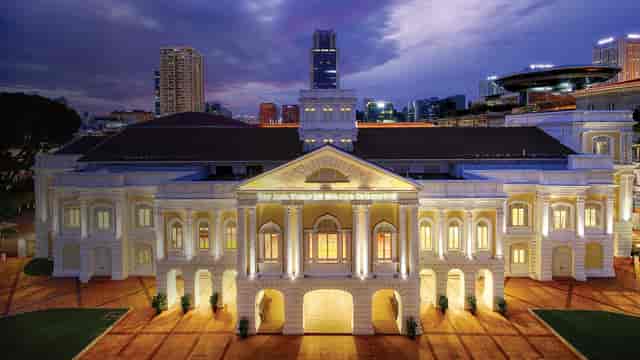 Elegant historical venue with ambient lighting for upscale events and meetings.